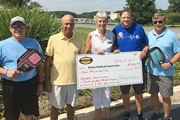 Pictured left to right: Steve Costa, Coastal Communities Pickleball League; Mike Smith, Co-Captain Team Cancer; Diane Barlow, Beebe Medical Foundation Gift Planning Officer; Stan Piesla, Coastal Communities Pickleball League, and Steve Melofchik, Captain 