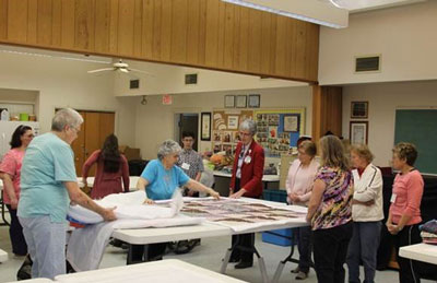 Shirley Loveland and the quilting group