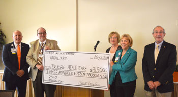 Beebe Auxiliary 2018 Check: Shown during the check presentation (left to right) are Tom Protack, Beebe Medical Foundation; Rick Schaffner, Executive Vice President and Chief Operating Officer, Beebe Healthcare; Nancy Tartaglione, outgoing President, Beebe
