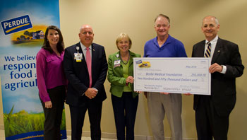 Shown during the check presentation (left to right) are Kim Nechay, executive director of The Franklin P. and Arthur W. Perdue Foundation; Thomas J. Protack, Vice President of Development, Beebe Medical Foundation; Judy L. Aliquo, CFRE, President and CEO 
