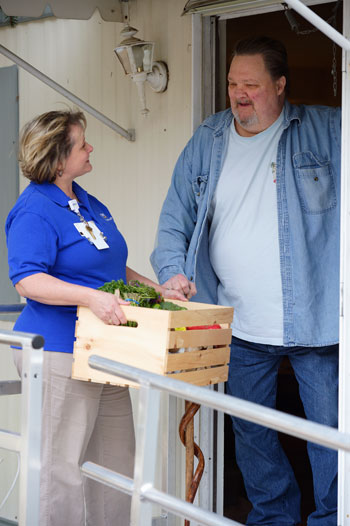 Catherine Murphy, Beebe Population Health, delivers food