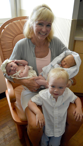Diane Marshall with three grand-kids.