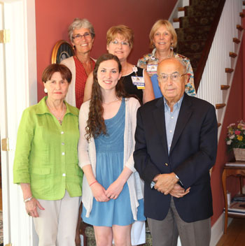 Angela Baker receives Saliba Scholarship check