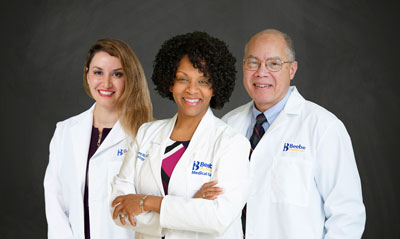 Shown are Dr. Samaneh Dowlatshahi; Dr. Karen Smith Coleman; and Dr. Carlton Boxhill.