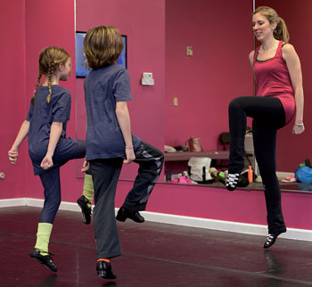 Dr. Erin Fletcher, DO, and children during Irish Dance class.