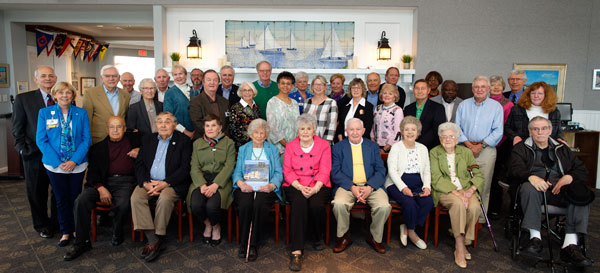 Shown are (left to right) in the back row: Jim Pierce, Richard Sharp, , Alex Moore, Phil Wescott, Bob Moore, Jan McCarty, Cheri Rich, Philip Ranalli, Dennis Chupella, Lillian Kuretu, Dr. Mwazhuwa Kuretu, Peggy Fisher and Bob Fisher. In the middle row are