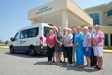 At the Tunnell Cancer Center are (l-r) Beebe Medical Foundation President and CEO Judy Aliquo, David Mann, Vicki Tull, Diane Barlow, Jim Martin, BMF Vice President of Development Tom Protack, Cherrie Rich, Judy Wetzel, Rick Schaffner, and Ruth La