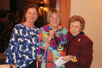Shown accepting the Professional Mentor Award is Elizabeth West, center, with Kim Blanch, left, and Jerry McLamb, right.