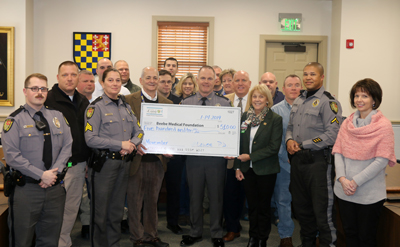 Shown (left to right) are: In front: Ellen Lorrane, Tyrone Woodward, Rich Schazza, Judy Aliquo, Tom Protack, Chief Thomas Spell, Jeff Fried, Sherri Harmon, Jim Azato, and Anthony Vallenti. In back are Chatham Marsch, Casey Crapps, Jamie Locklear, Jonatha