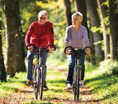Man and woman biking