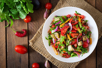A Mediterranean diet with lots of fresh vegetables, garlic, onions, and olive oil is recommended.