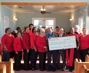 (Shown left to right): Lorie Hopkins; Carolyn A. Morris; Shore Clark; Janie Miller; Joyce Rickards; Sandra Neal; Charles S. Cramer Sr.; Barry Hamp, executive director of Beebe’s Oncology Services; Rev. Marjorie Belmont Burns; Diane Barlow, gift planning o