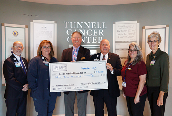 Barry Hamp, Executive Director, Beebe Oncology Services; Teresa Lesher, Clinical Nurse, Tunnell Cancer Center; Drew Sunderlin, Event Chair, “Progress for Prostate” Committee; Tom Protack, Vice President of Development, Beebe Medical Foundation; Brandi Den