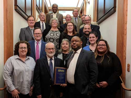 The team that led improvements to the radiology order entry process at Beebe Healthcare won 2018 Quality and Safety Award. First row (shown left to right): Michele Mankins, RT(R)(CV); Robert Urbanski; Dan Mapes; Norma Shelton, ABS, CHAA; Maurice Winkfield