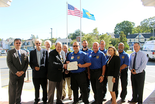 Shown during the presentation (left to right) are chapter members Buddy Clark, Wayne Weimer, Darryl Hudson, Bill Richardson, and. Bill Regli. Accepting the honor on behalf of Beebe Healthcare are public safety officers, Joe Pembroke, Mark Broadhurst, Andy