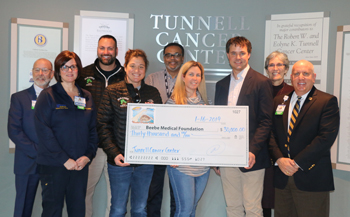 Pictured left to right: Barry Hamp, Executive Director, Oncology Services; Lisa Henderson, RN, Nurse Manager, Tunnell Cancer Center; Al Tortella, Owner, Tortella Enterprises, Paradise Grill; Sandy Samsel, Controller, Tortella Enterprises, Paradise Grill; Pictured left to right: Barry Hamp, Executive Director, Oncology Services; Lisa Henderson, RN, Nurse Manager, Tunnell Cancer Center; Al Tortella, Owner, Tortella Enterprises, Paradise Grill; Sandy Samsel, Controller, Tortella Enterprises, Paradise Grill;