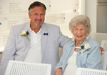 Alex Moore and Anna Beebe Moore, grandson and daughter of the founders of Beebe, wait for the unveiling.