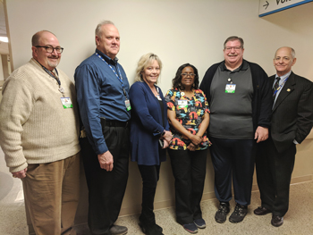 Environmental Services Tech Janet Miller (third from right) is the recipient of Beebe Healthcare’s January 2019 L.O.V.E. Letter. Also pictured from left to right are Rick Schaffner, Chief Operating Officer; Tim Gwaltney, Director, Environmental Services; 