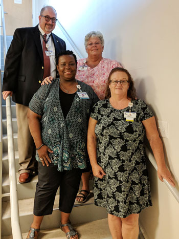 Tracy Fleetwood, Pre-Arrival Scheduler, (bottom right) is the September 2018 recipient of the L.O.V.E. Letter Award. Also pictured clockwise from top are Rick Schaffner, Executive Vice President and Chief Operating Officer; Tracy O’Hara, Manager, Pre-Arri