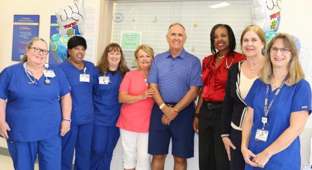 Celebrating Excellent Care are (l-r) Lynn Dalrymple, RN; Saleicha Baksh; Amber Holland, CNA; Sharon and John Kennedy; Karen McGibbon, MD; Barbara Peterson; and Karen Bryner. Celebrating Excellent Care are (l-r) Lynn Dalrymple, RN; Saleicha Baksh; Amber Holland, CNA; Sharon and John Kennedy; Karen McGibbon, MD; Barbara Peterson; and Karen Bryner.