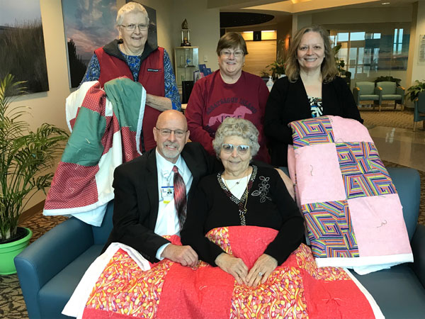 Shirley and the Quilt Group with Barry Hamp at Tunnell Cancer Center. Shirley and the Quilt Group with Barry Hamp at Tunnell Cancer Center.