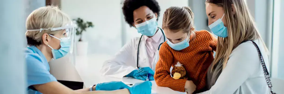 mother and daughter checking in at the emergency department