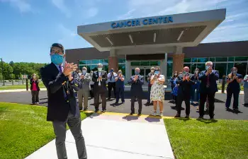 Dr. David Tam &amp; Team Beebe celebrating the opening of South Coastal Cancer Center.