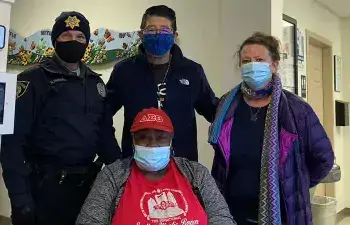 Dr Tam with partners Georgetown Police, La Esperanza, and First State Community Action during a vaccination event in Georgetown.