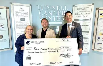 Caption: From left to right, Brittany Boleyn, MSN, RN with Beebe Oncology, Garth Huffman from Bellmoor Inn, and Sean Flanigan - Beebe Medical Foundation.
