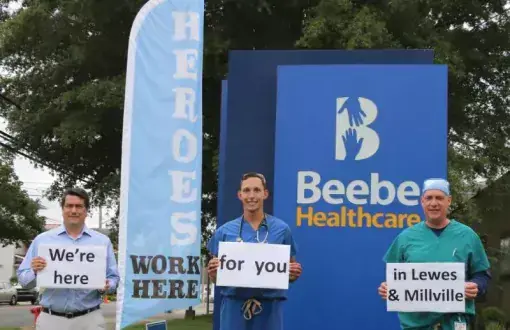 Dr. Kevin Bristowe, Logan Mathews and Andy Fitzkee celebrate providing excellent care to Beebe patients at Beebe Emergency Departments in Lewes and Millville
