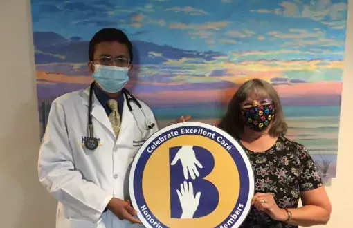 Judy Wells, right, celebrates the compassionate care her late husband Arnold received from medical oncologist Nisarg Desai, MD, at Tunnell Cancer Center.