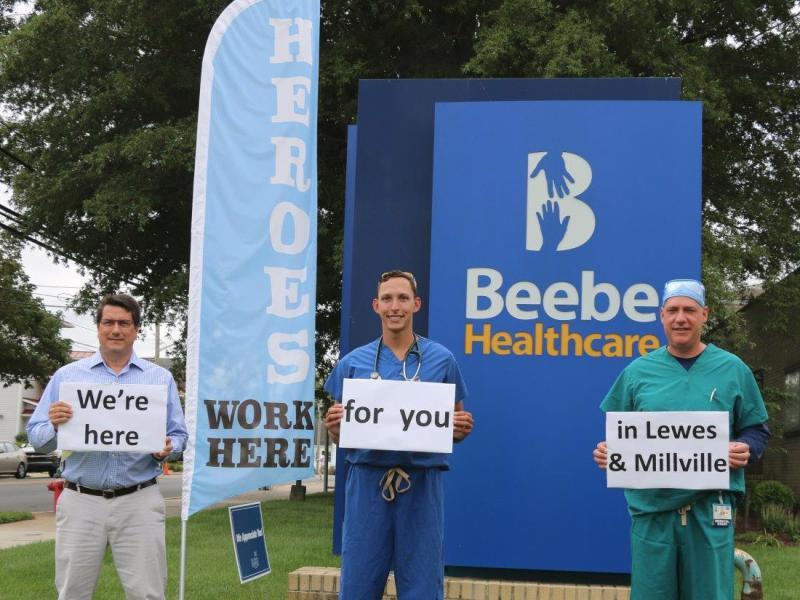 Dr. Kevin Bristowe, Logan Mathews and Andy Fitzkee celebrate providing excellent care to Beebe patients at Beebe Emergency Departments in Lewes and Millville