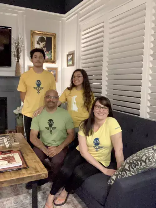 Anne with her family prior to the pandemic