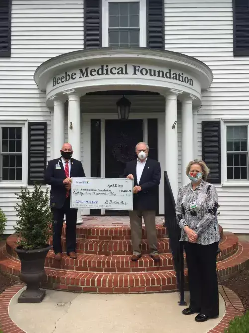 LBPW donation.JPG Tom Protack, left, President of Beebe Medical Foundation, stands with Pres Lee, President of Lewes BPW, and Kay Young, Director of Development, Beebe Medical Foundation after the BPW donated $85,000 to the COVID-19 Relief Fund.