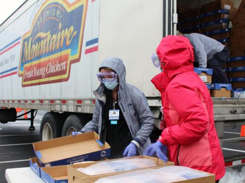 Team members helping during event