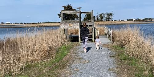 Reba walking outside with her son