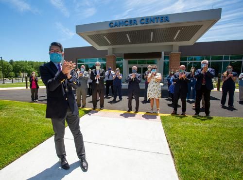 Dr. David Tam & Team Beebe celebrating the opening of South Coastal Cancer Center.