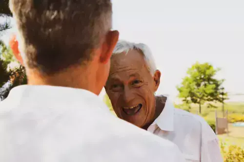 Man and friend out for golf after surgery