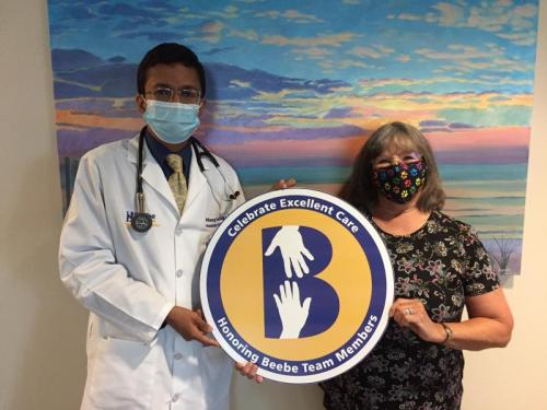 Judy Wells, right, celebrates the compassionate care her late husband Arnold received from medical oncologist Nisarg Desai, MD, at Tunnell Cancer Center.