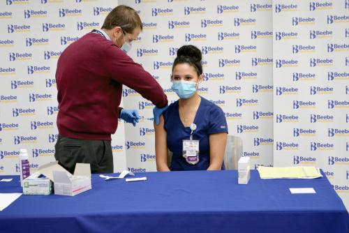 Sintia Rodriguez, RN, is the first to receive the COVID-19 vaccine in Sussex County, Delaware.