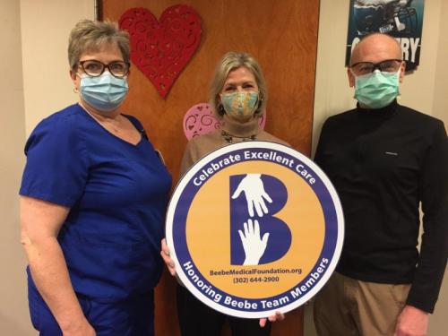Beebe Health Sciences Librarian Jean Winstead, center, celebrates the excellent care - and unexpected diagnosis - she received from Dr. James Spellman and Mary Spradlin, his nurse. Shown are (l-r) Spradlin, Winstead and Spellman.