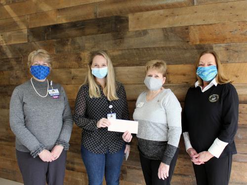 Tracy Bell, program coordinator for the Margaret H. Rollins School of Nursing; recipient Erin Bendler; and Suzanne Olkowski, education and libraries chair, and Lynn Barberi, vice president, GFWC Zwaanendael Women’s Club.