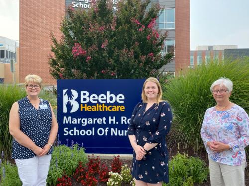 Tracy Bell, Program Coordinator at Margaret H. Rollins School of Nursing at Beebe Healthcare, Kristen Landry, scholarship recipient, and Karen Lucas, Lord Baltimore Lioness Club President.