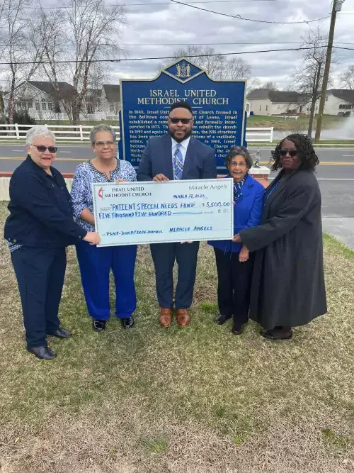 Miracle Angels Check Presentation 2022.jpg Executive Director of Beebe Healthcare’s Oncology Services Maurice Winkfield receives the check from Miracle Angel members, Betty Streett, Sandra Neal, Carolyn A. Morris and Rev. Marjorie Belmont-Burns.
