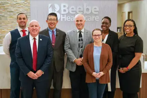 Pictured left to right:   Ryan Arias, DO, Core Faculty, Tom Protack, President, Beebe Medical Foundation, Dr. David Tam, President &amp; CEO, Beebe Healthcare, Jeffrey Hawtof, MD, FAAFP, Associate Program Director, Tanya Ray, MS, Administrative Director, Graduate Medical Education, Joyce Robert, MD, FAAFP, Program Director for the Family Medicine Residency, Cynthia Lamour, DO, General Faculty.