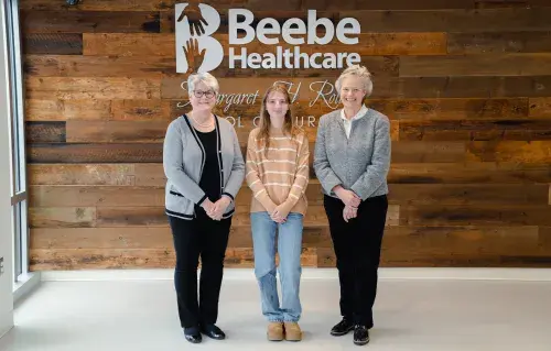 Photo of Edna W. Wyatt Scholarship recipient and leaders, from left to right: Tracy Bell; Mya Dellinger, scholarship recipient; Kay Young.