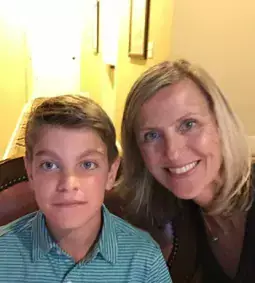 Content image: Bridget and her son on the way to a baseball game. Image file: Bridget and her son on the way to a baseball game.