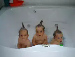 Content image: Bridget's triplets as babies. Image file: Bridget's triplets as babies.