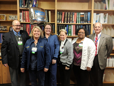 Clinical Educator Theresa Crowson (second from left) is the recipient of Beebe Healthcare’s December 2018 L.O.V.E. Letter. Also pictured from left to right are Rick Schaffner, Chief Operating Officer; Laura Smith, Clinical Educator; Jan Gibson-Gerrity, Di